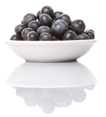Blueberry fruits over white background