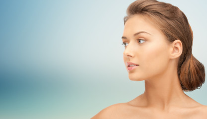 beautiful young woman face looking aside