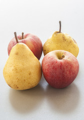 Apple and Pear close up on white background