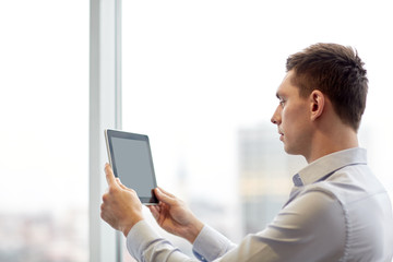 businessman with tablet pc in office