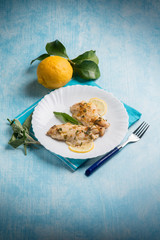 fish fillet with lemon and sage