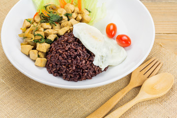 Spicy fried chicken with basil leaves and rice