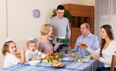 Happy family member receiving present