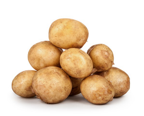 heap of young potatoes isolated on white background