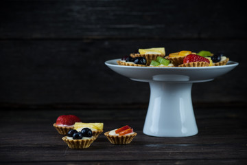 Mini fresh fruit tartlets on platter