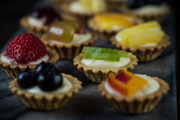 Mini pastry tartlets with fresh fruits
