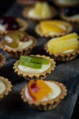 Mini pastry tartlets with fresh fruits