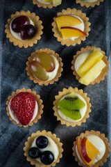 Mini pastry tartlets with fresh fruits