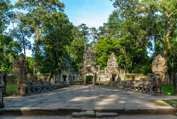 sight of the entry with of the gopuras and devas and nagas of the archaeological enclosure of preah khan, siam reap, cambodia