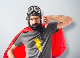 Superhero doing bad signal