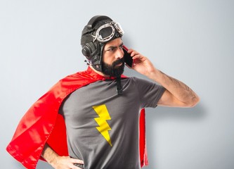 Superhero talking to mobile