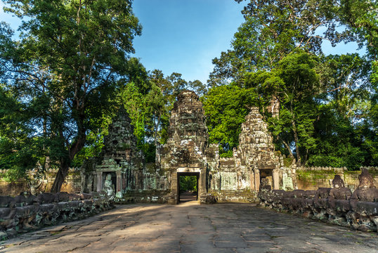 sight of the entry with of the gopuras and devas and nagas of the archaeological enclosure of preah khan, siam reap, cambodia