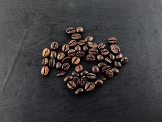 coffee beans isolated on wood background
