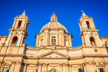 Obraz premium Rome, Italy. Sunrise in Piazza Navona in Roma with the church of Sant'Agnese in Agone.