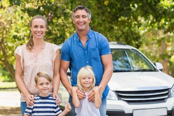 Fototapeta premium Happy family getting ready for road trip