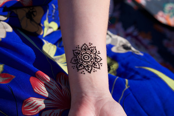 henna tattoo mehendy on hand mandala