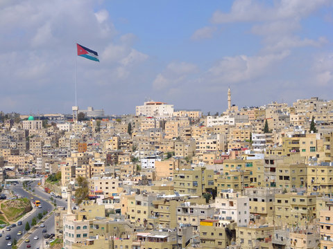 Amman flag and  skyline, Jordan