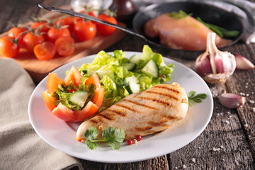 grilled chicken breast and salad
