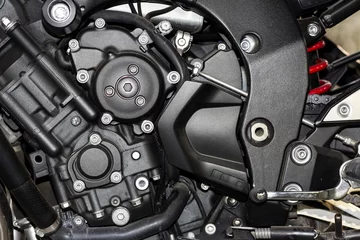 Fototapeten Engine / A surface of big bike engine © GroupO FRL