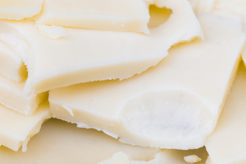close-up sliced white sheese maasdam