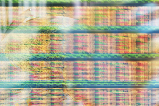 Ticker tape stock market financial data moving quickly on screen
