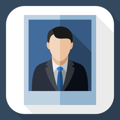 Picture of a man in a business suit with long shadow