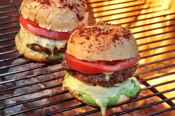 Closeup of Homemade Burgers On Hot BBQ Grill
