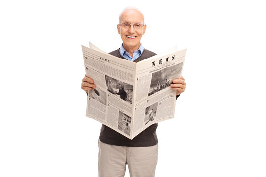 Senior gentleman reading a newspaper