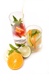 fresh cold cocktail in glass with sliced citus