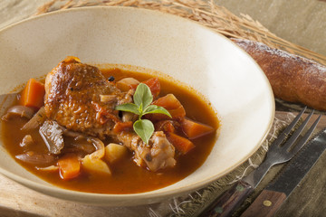 chicken stewed tomato sauce chicken stewed in a dish decorated on the table