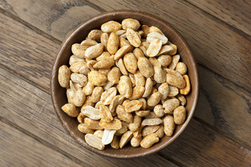 Rustic spicy dry roasted peanuts detail from above.