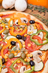 hot pizza with garnish and components