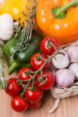 group fresh colored vegetables on wooden