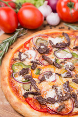 hot pizza with garnish and components