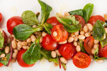 closeup salad from colored fresh vegetables