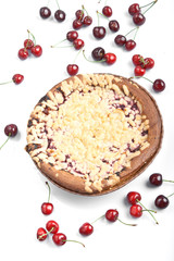 sweet round baked cake with cherry