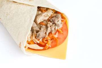 roll from lavash with stuffing meat, cheese and vegetables