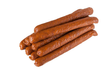 pile meat flavour sausages on white