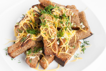 roast rusk from bread with cheese and garlic
