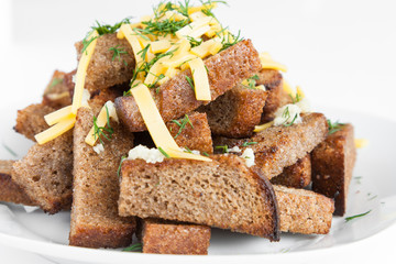 roast rusk from bread with cheese and garlic