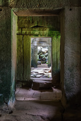 interior of gallery ruined in the archaeological place of ta prohm in siam reap, cambodia