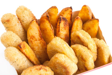 Box with roast chicken nuggets, stick, potato