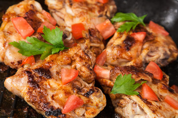 cook chicken  with spice on frying pan