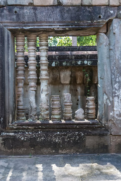 window with columns with frames of a building in ta keo in siam reap, cambodia