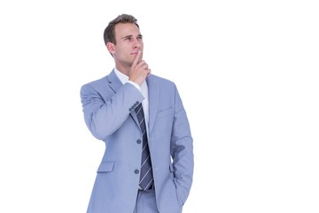 Handsome businessman thinking with finger on chin 