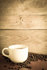 coffee with coffee beans wooden table
