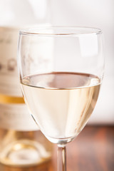 glass and bottle white wine