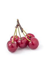 Fresh ripe organic sour cherries isolated on a white background
