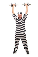 Prison inmate with dumbbells isolated on white