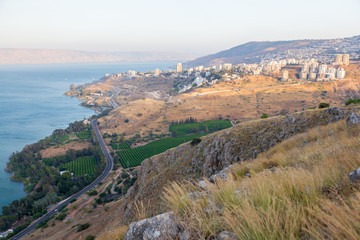 Obraz premium Tiberias city town and Kineret Galilee sea view on sunset.